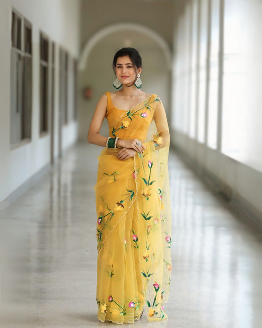 Graceful Yellow Organza Saree with Floral Embroidery Design