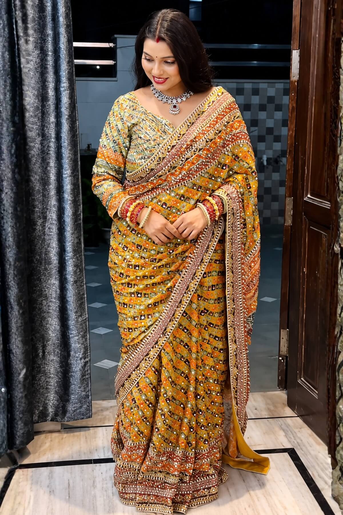 Improbable Yellow Chinon Silk Printed Mirror Work Saree