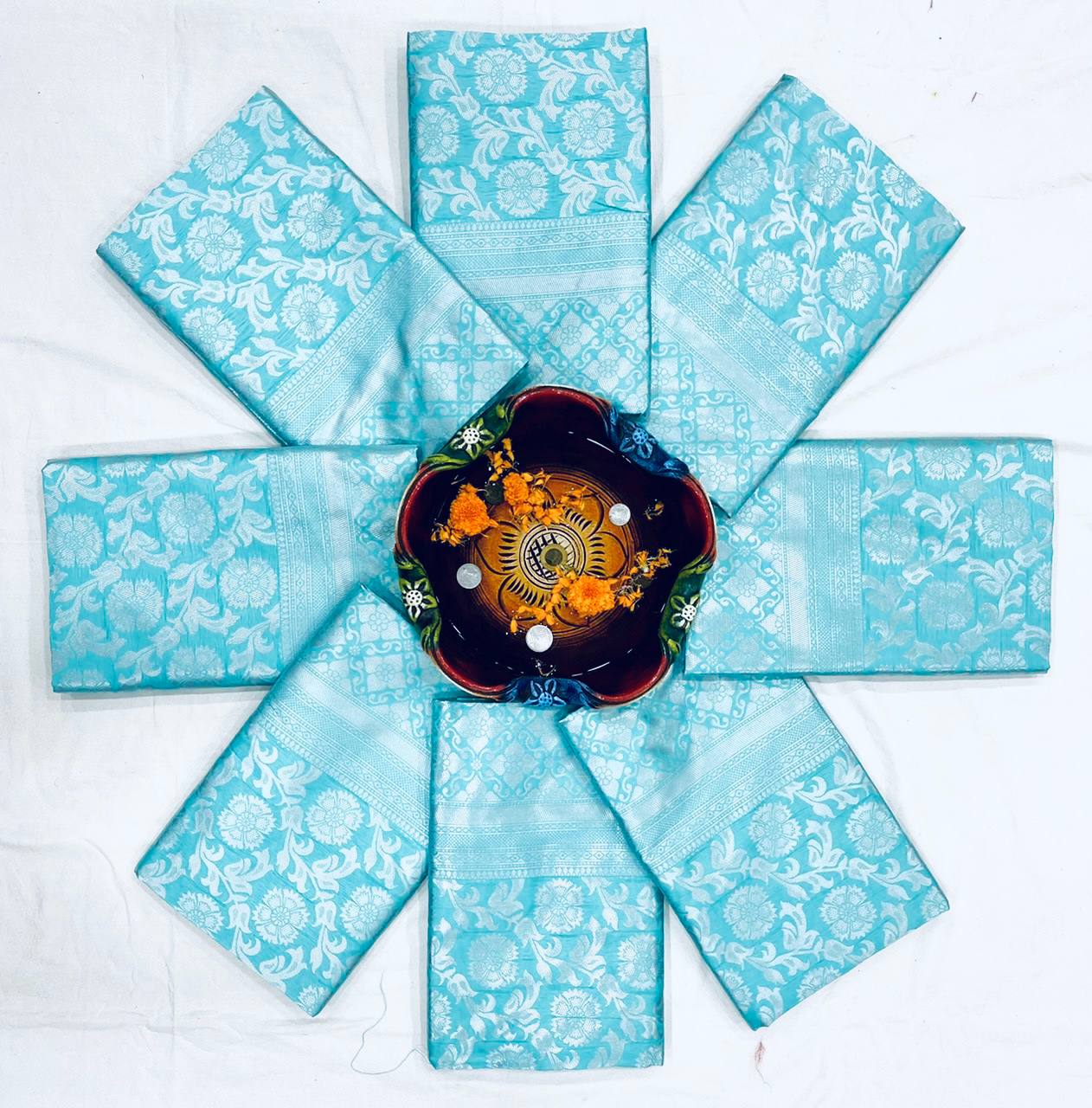 Elegant Teal Blue Silk Saree with Floral Weaving & Traditional Pearl Jewelry Look