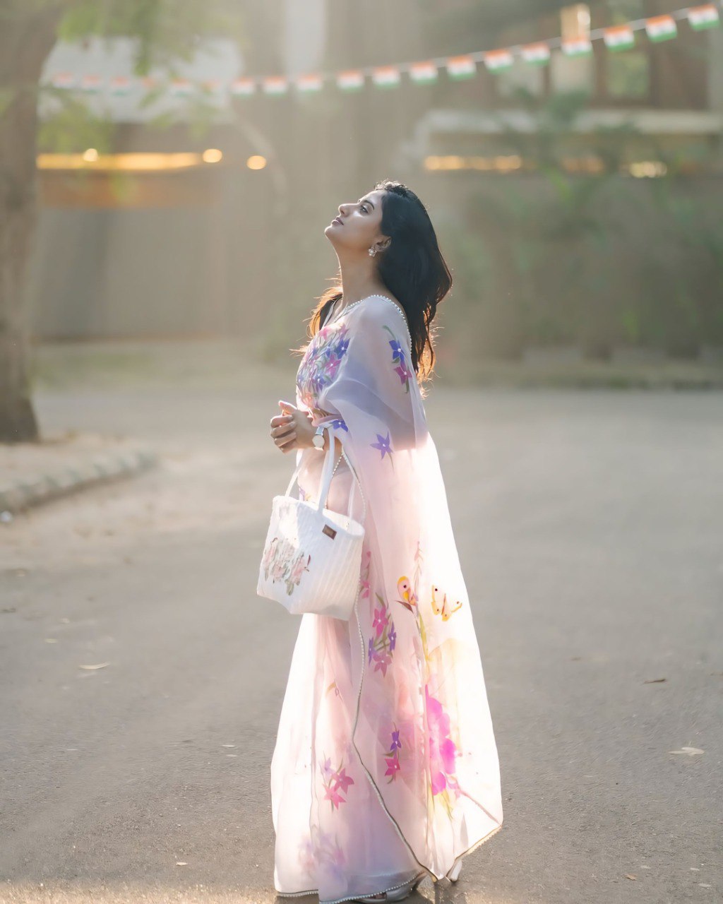 Blush Blossom – Pastel Floral Organza Saree with Elegant Sheer Drape