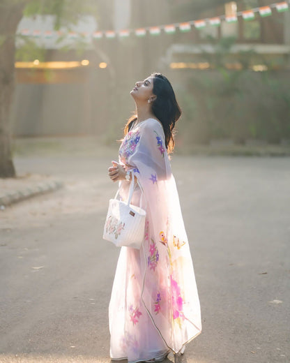 Blush Blossom – Pastel Floral Organza Saree with Elegant Sheer Drape
