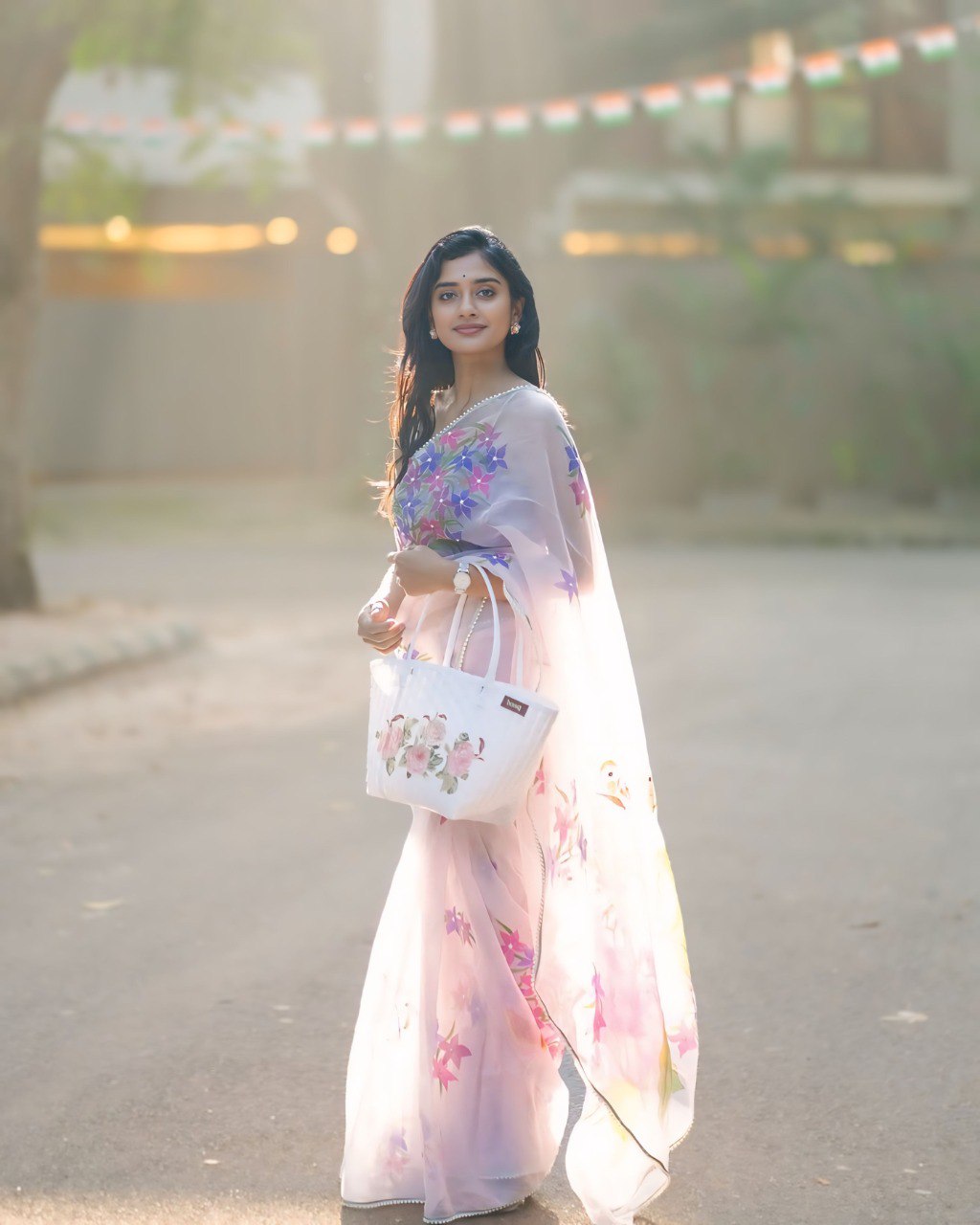 Blush Blossom – Pastel Floral Organza Saree with Elegant Sheer Drape