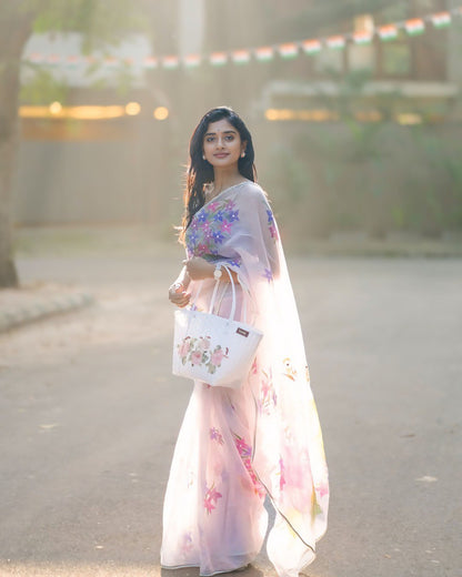 Blush Blossom – Pastel Floral Organza Saree with Elegant Sheer Drape