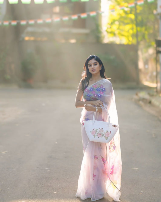 Blush Blossom – Pastel Floral Organza Saree with Elegant Sheer Drape