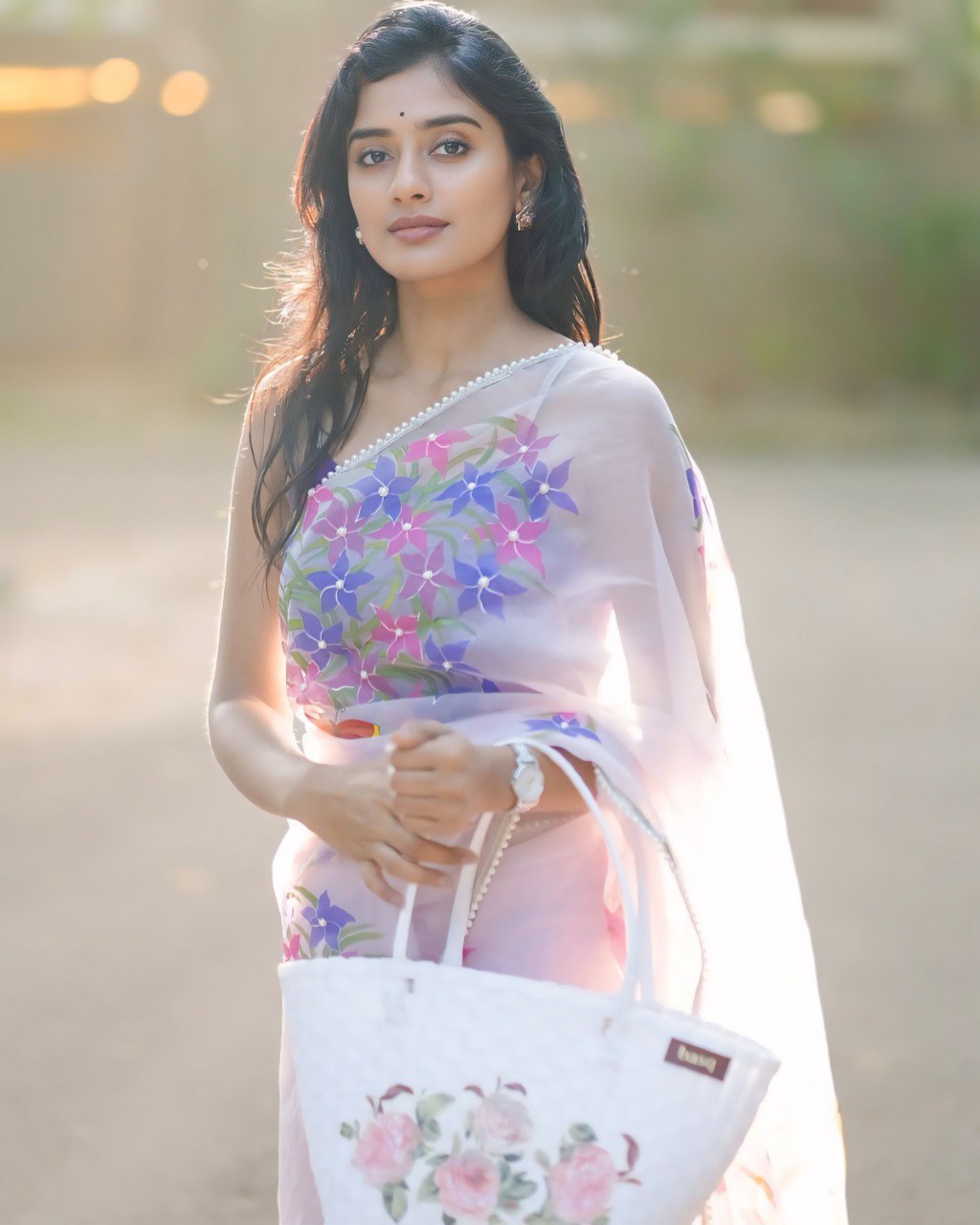 Blush Blossom – Pastel Floral Organza Saree with Elegant Sheer Drape