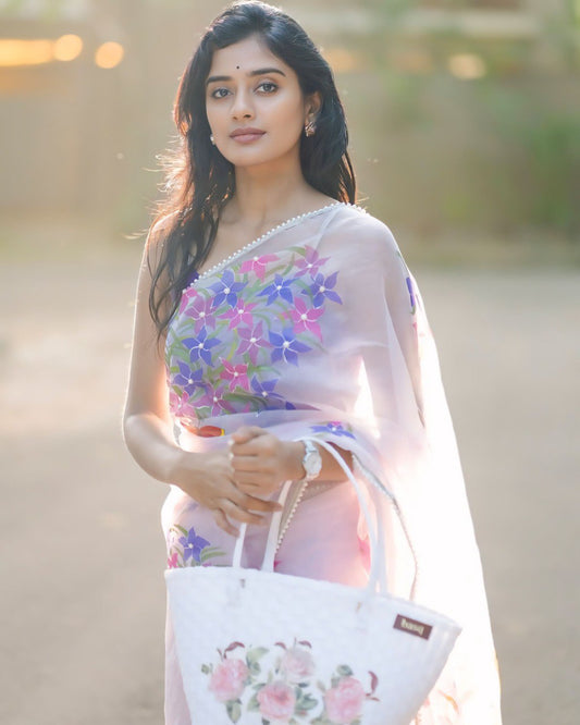 Blush Blossom – Pastel Floral Organza Saree with Elegant Sheer Drape
