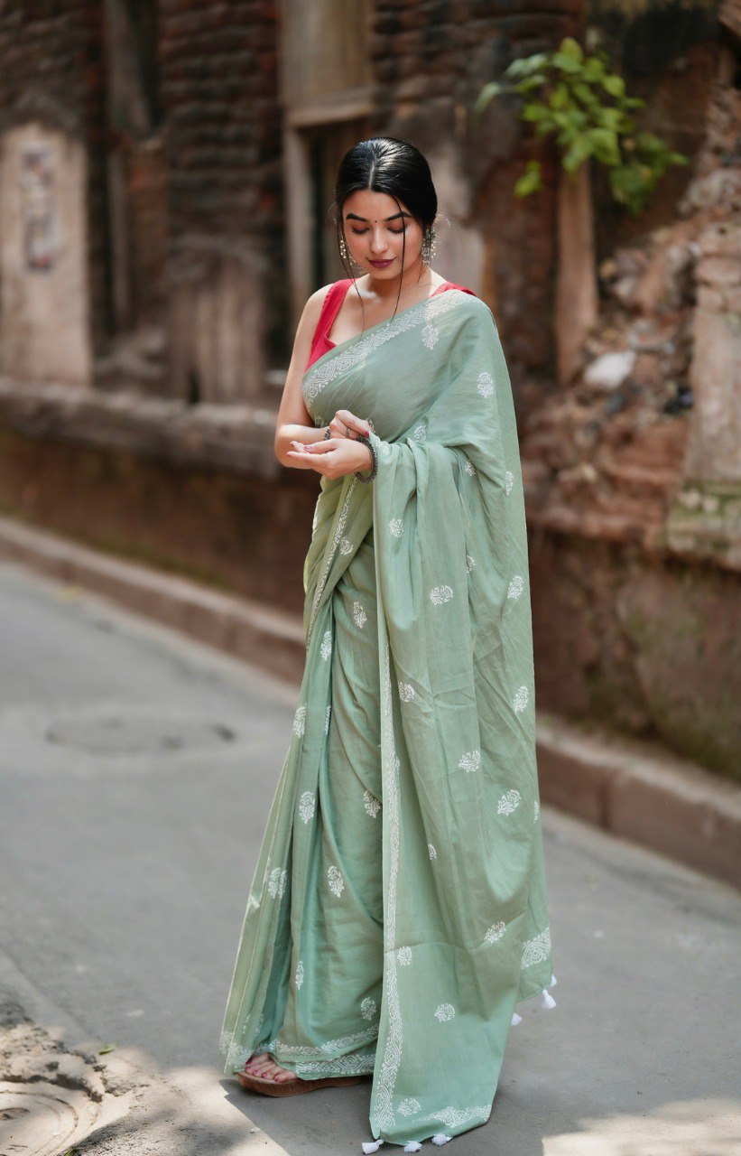 Mint Grace – Elegant Sage Green Soft Silk Saree with Delicate Woven Border