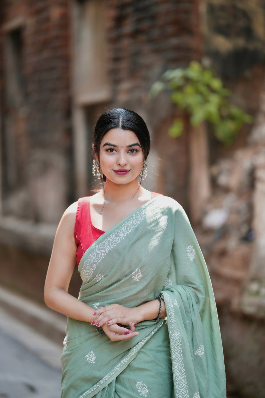 Mint Grace – Elegant Sage Green Soft Silk Saree with Delicate Woven Border