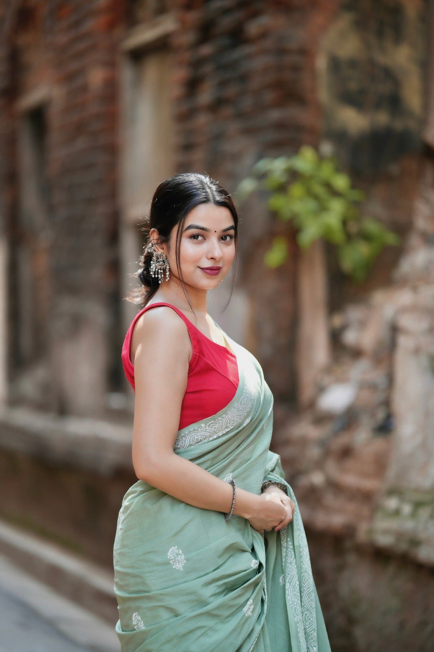Mint Grace – Elegant Sage Green Soft Silk Saree with Delicate Woven Border
