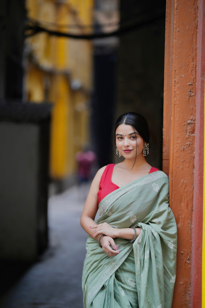 Mint Grace – Elegant Sage Green Soft Silk Saree with Delicate Woven Border