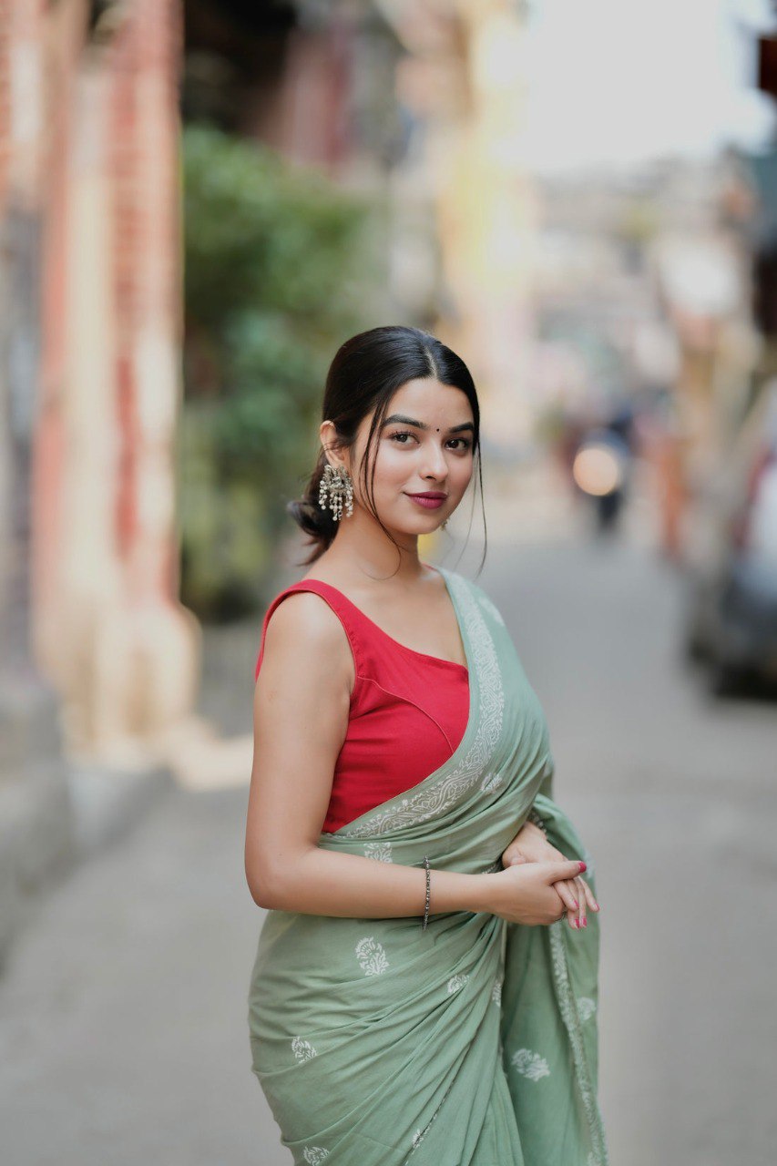 Mint Grace – Elegant Sage Green Soft Silk Saree with Delicate Woven Border