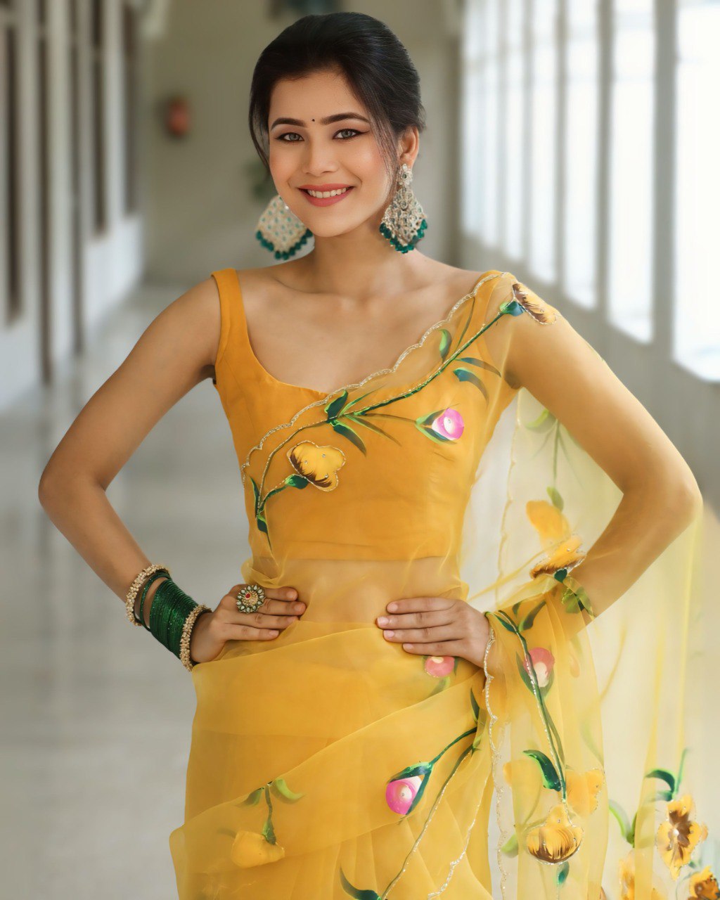 Graceful Yellow Organza Saree with Floral Embroidery Design