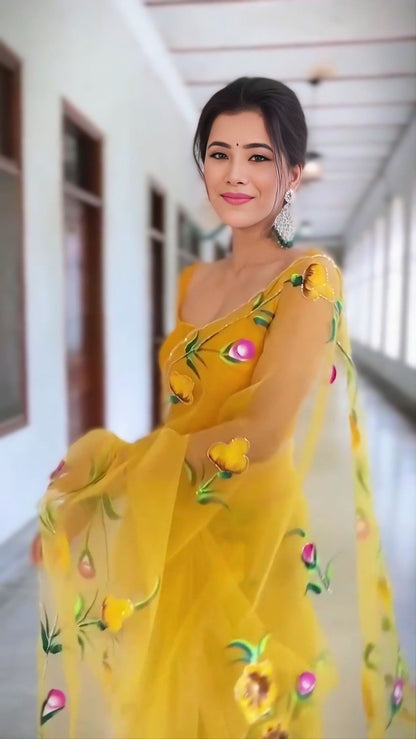 Graceful Yellow Organza Saree with Floral Embroidery Design