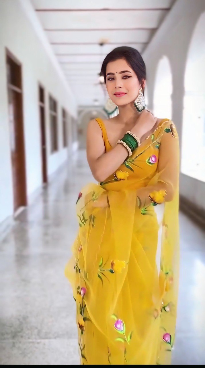 Graceful Yellow Organza Saree with Floral Embroidery Design