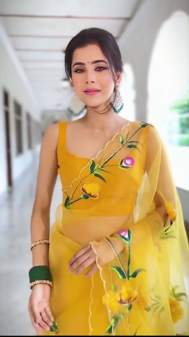 Graceful Yellow Organza Saree with Floral Embroidery Design
