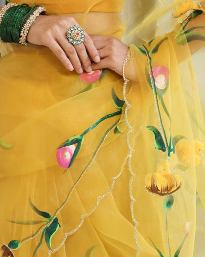 Graceful Yellow Organza Saree with Floral Embroidery Design