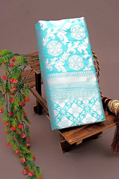 Elegant Teal Blue Silk Saree with Floral Weaving & Traditional Pearl Jewelry Look